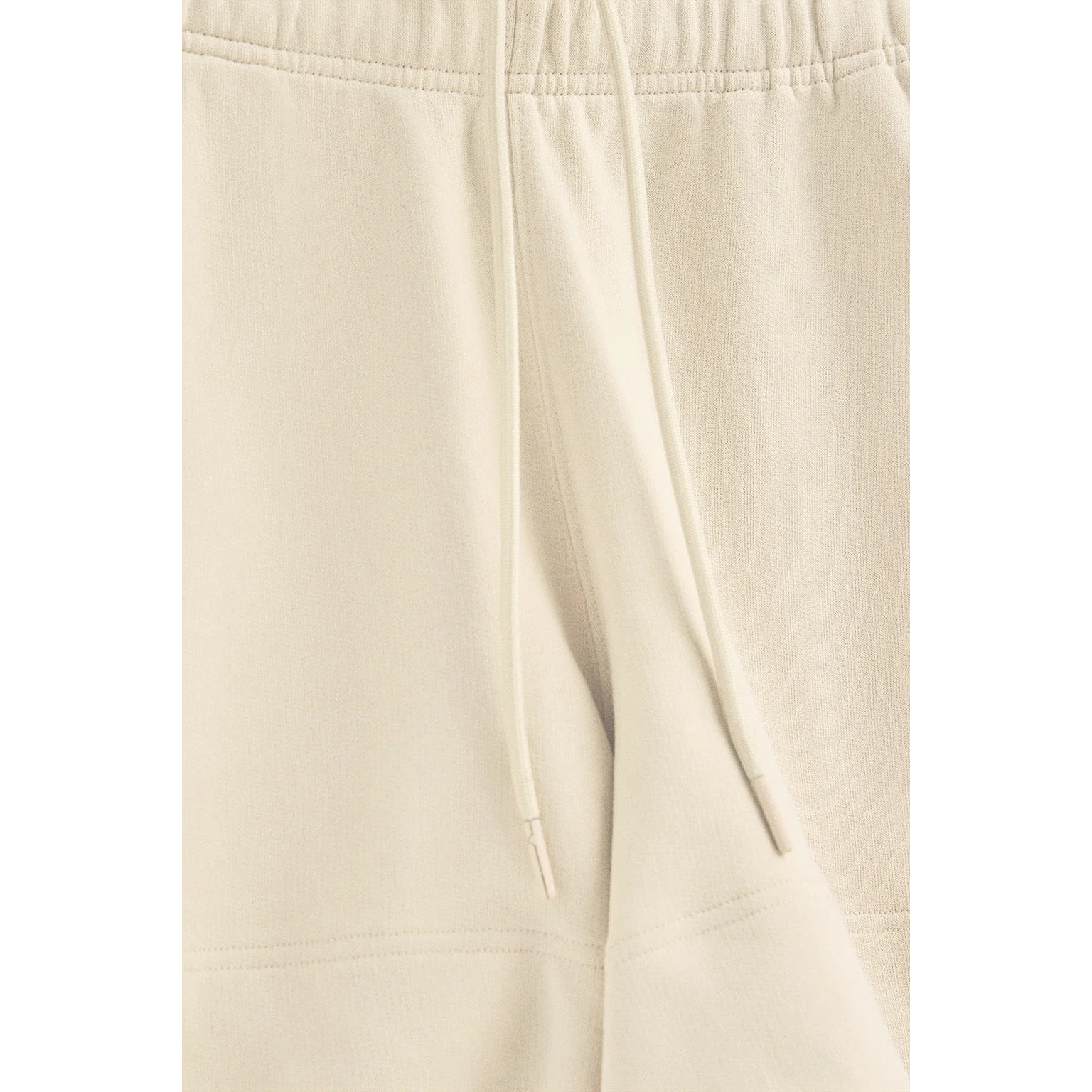 Pantalón corto de algodón color crudo con logo bordado