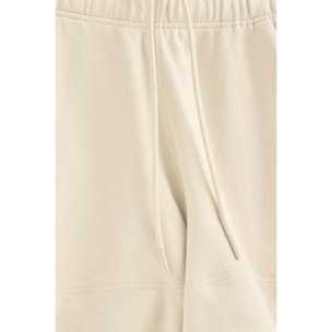 Pantalón corto de algodón color crudo con logo bordado
