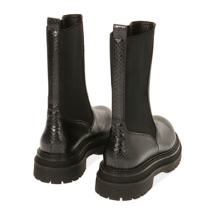 Botas Chelsea negras con estampado de víboras y tacón de 5 cm.