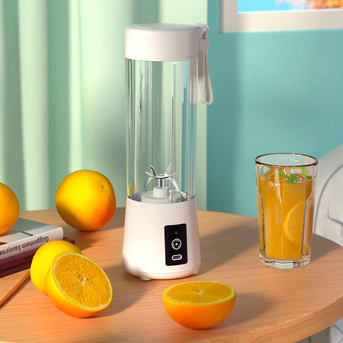 Batidora portátil A6 de 450 ml con 6 cuchillas de acero inoxidable y motor de 150W. Compacta, con batería recargable de 4000 mAh y fácil de transportar.