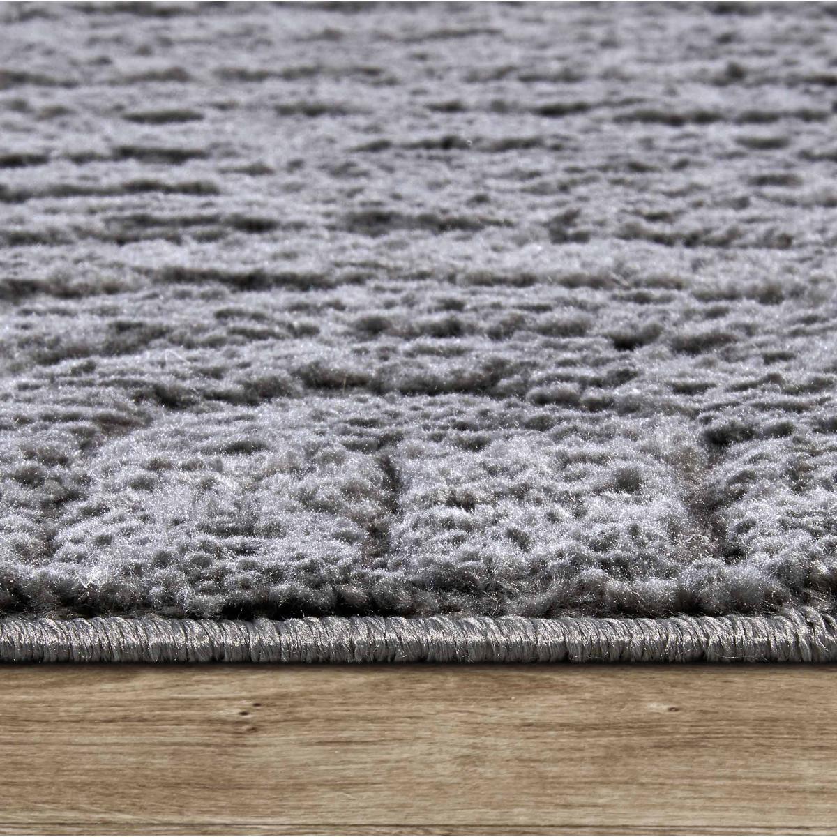 Tapis salon, motif géométrique, texture relief, lym chaleureux