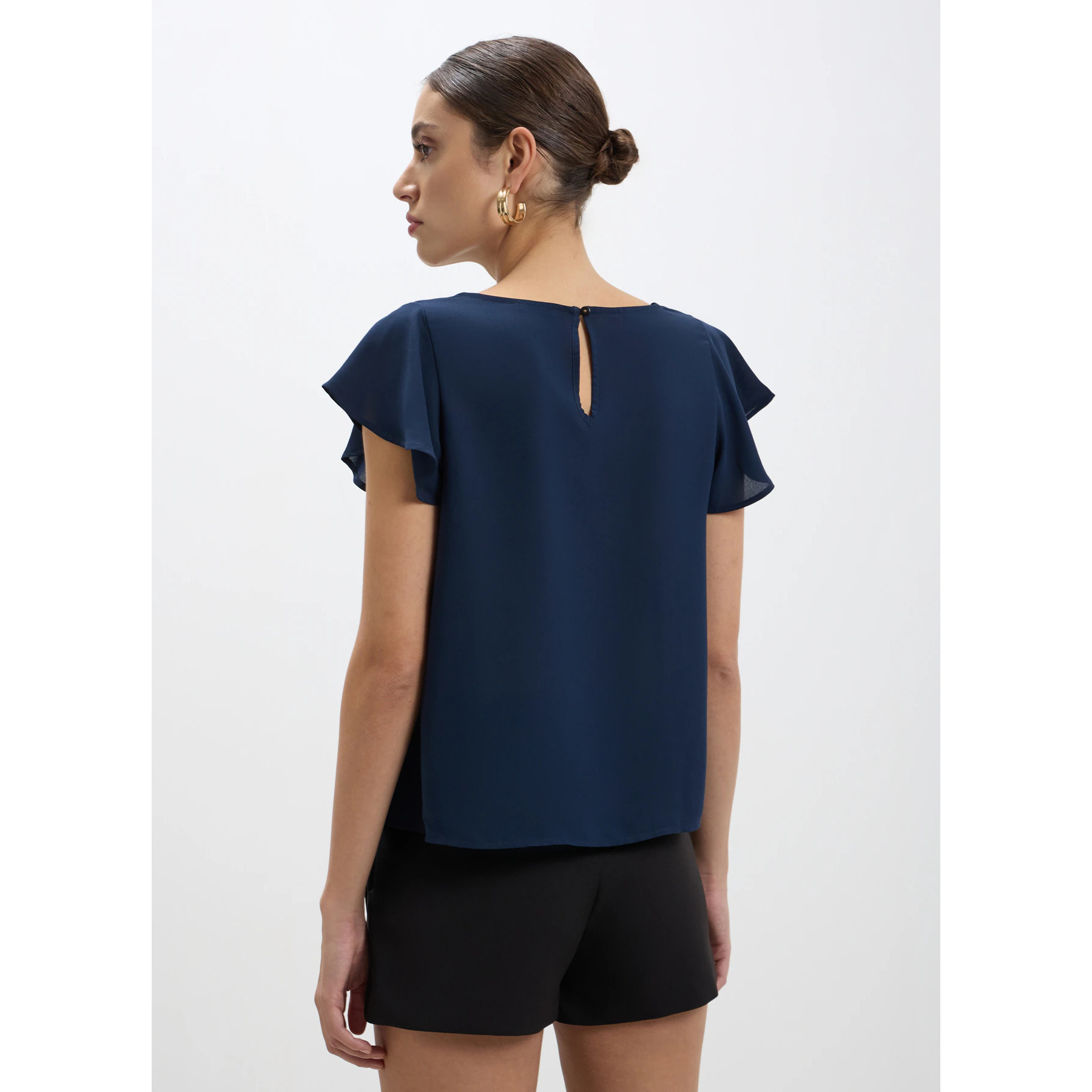 Blusa manica con volant