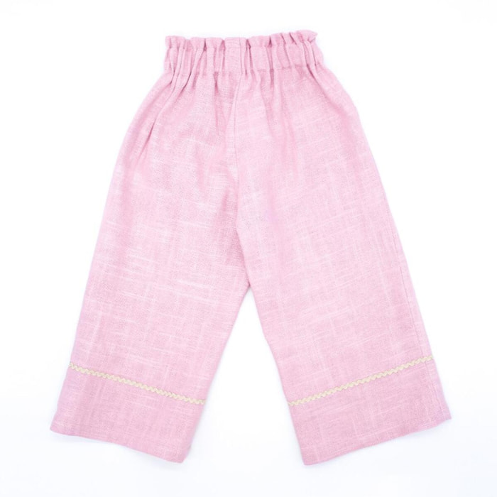 Pantalón largo de lino rosa. Elastico en la cintura, picunela en el bajo.