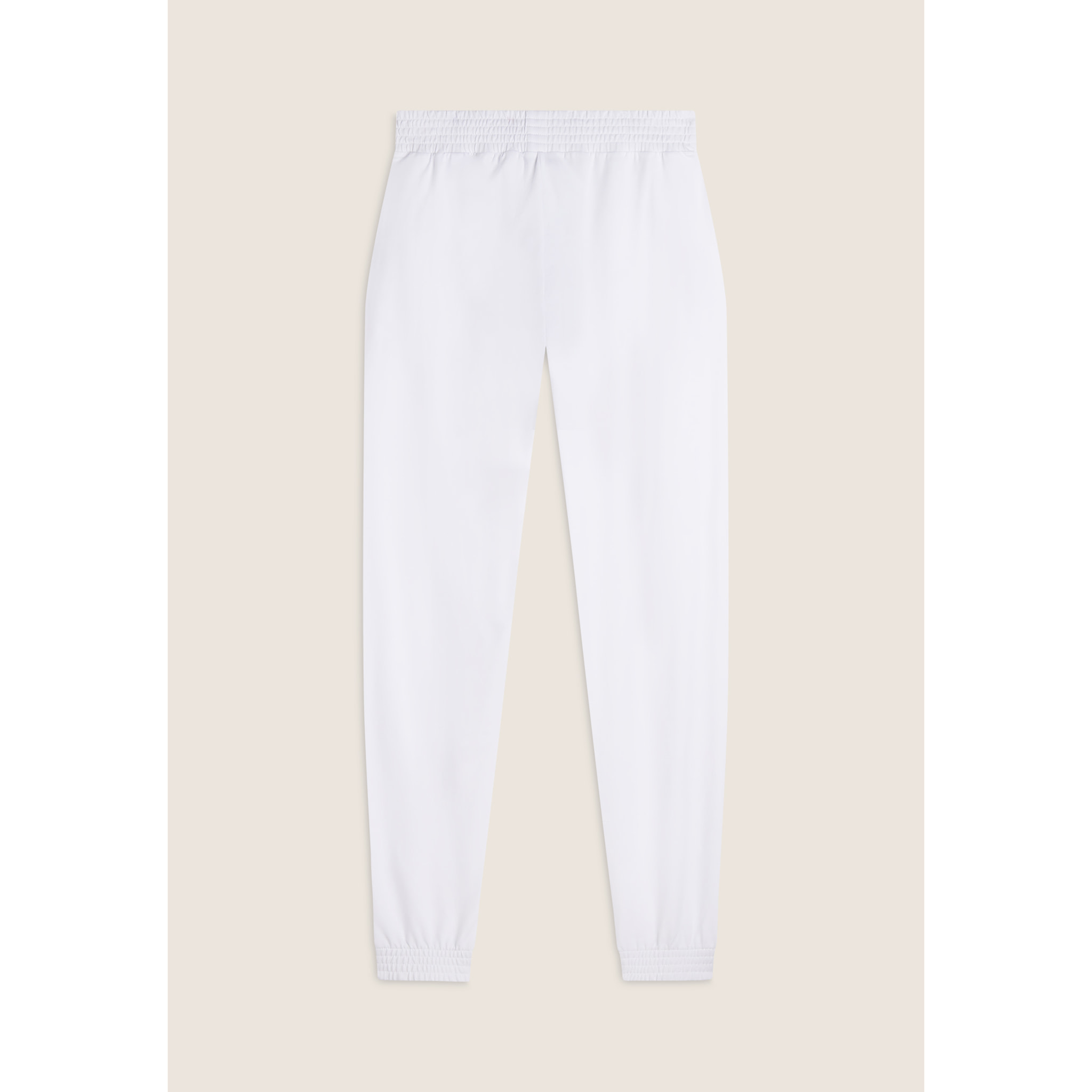 Pantaloni con elastico sul fondo e dettagli floreali