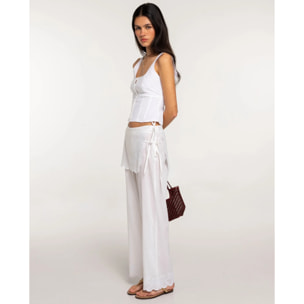 Pantalones anchos con bordados de mujer