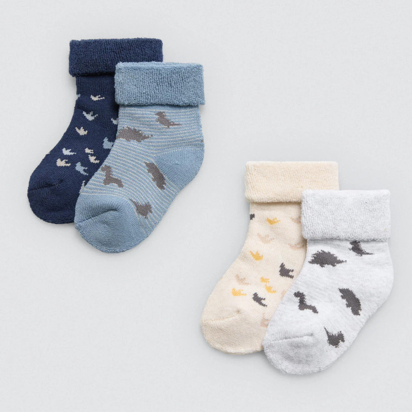 Confezione da 4 calzini termici per neonato a forma di dinosauro