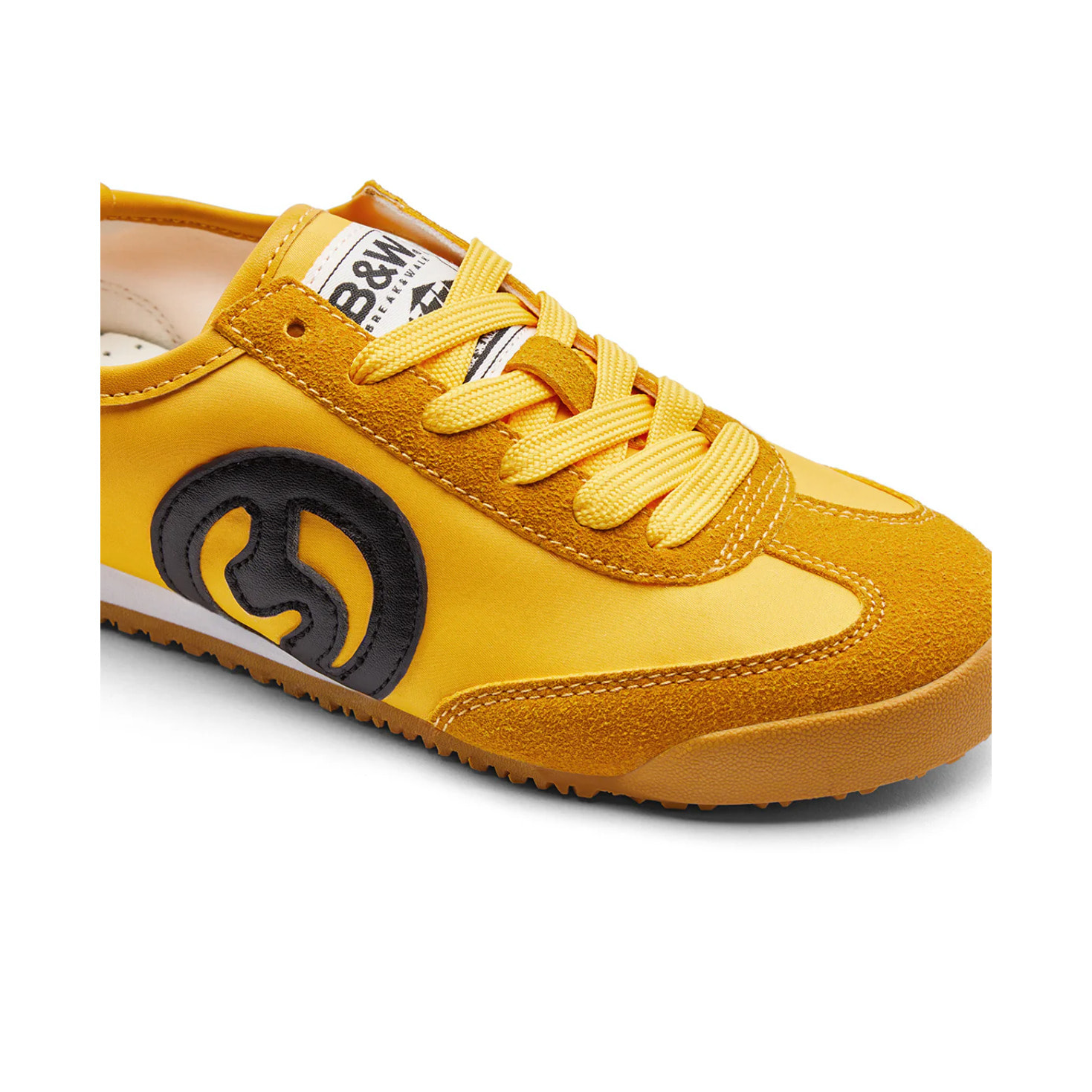 Sneakers gialle con dettagli in pelle scamosciata