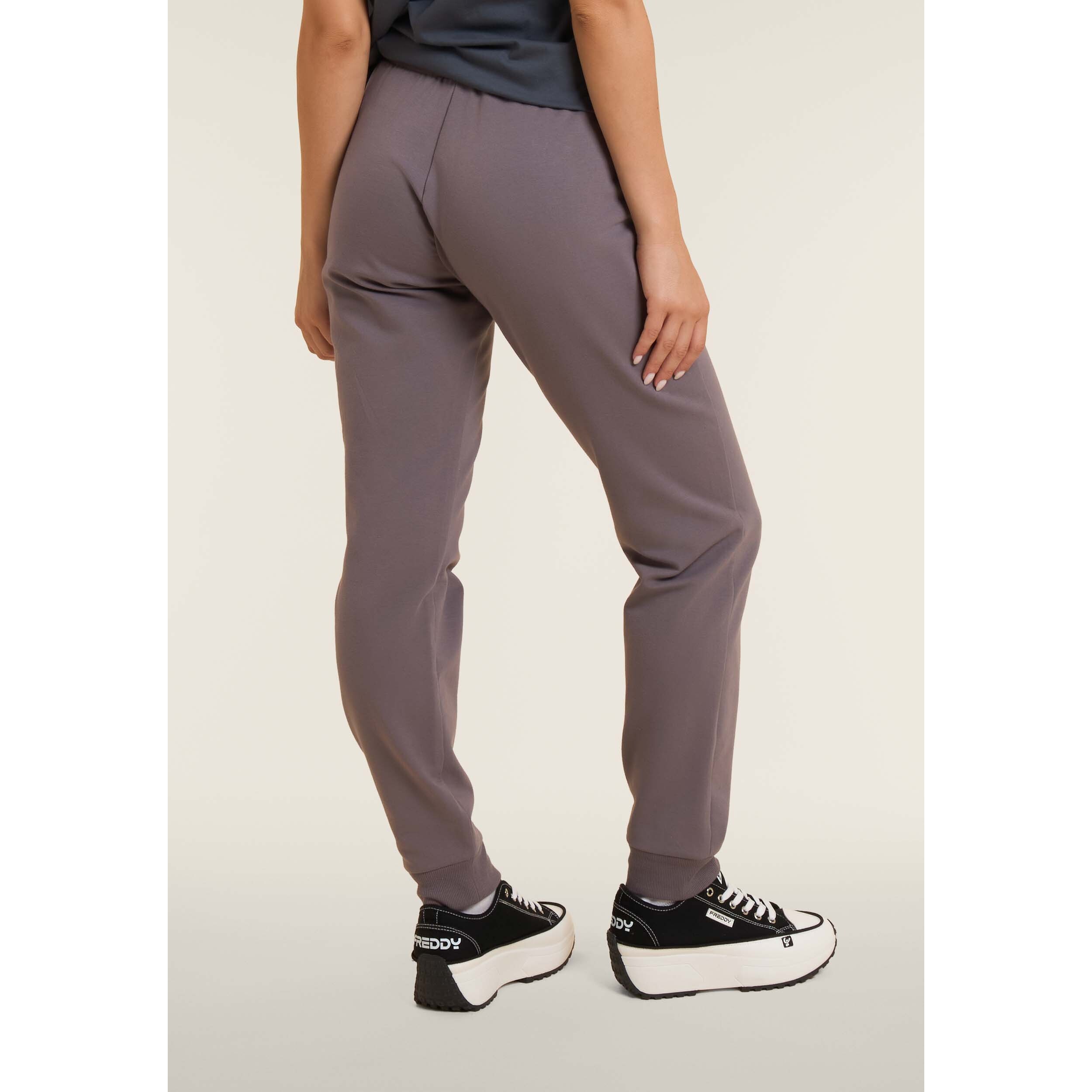 Pantaloni sportivi con fondo a polsino e coulisse