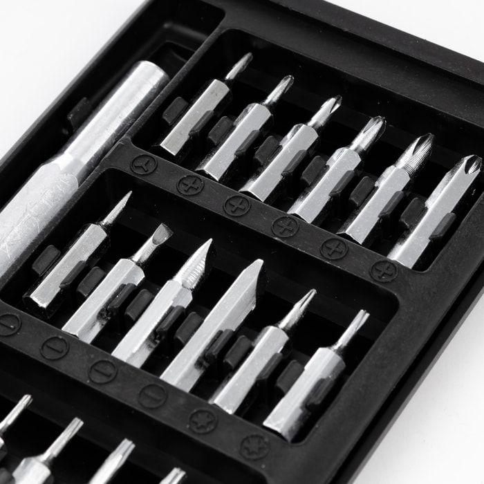 Juego de destornillador 24 en 1 con cuerpo metálico, carcasa con apertura por deslizamiento y puntas de acero.