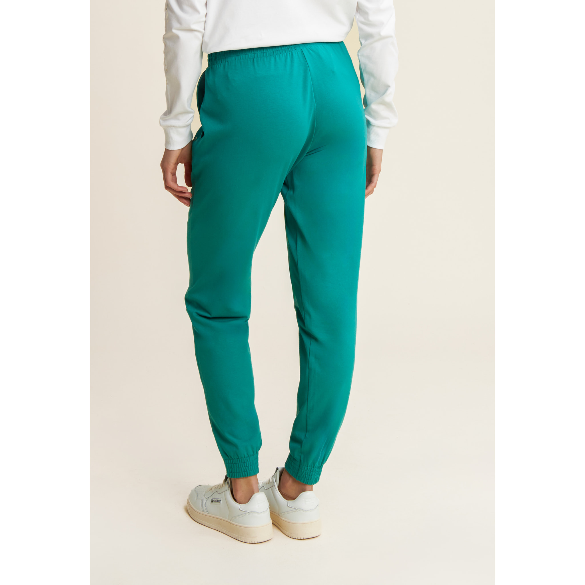 Pantaloni con elastico sul fondo e dettagli floreali