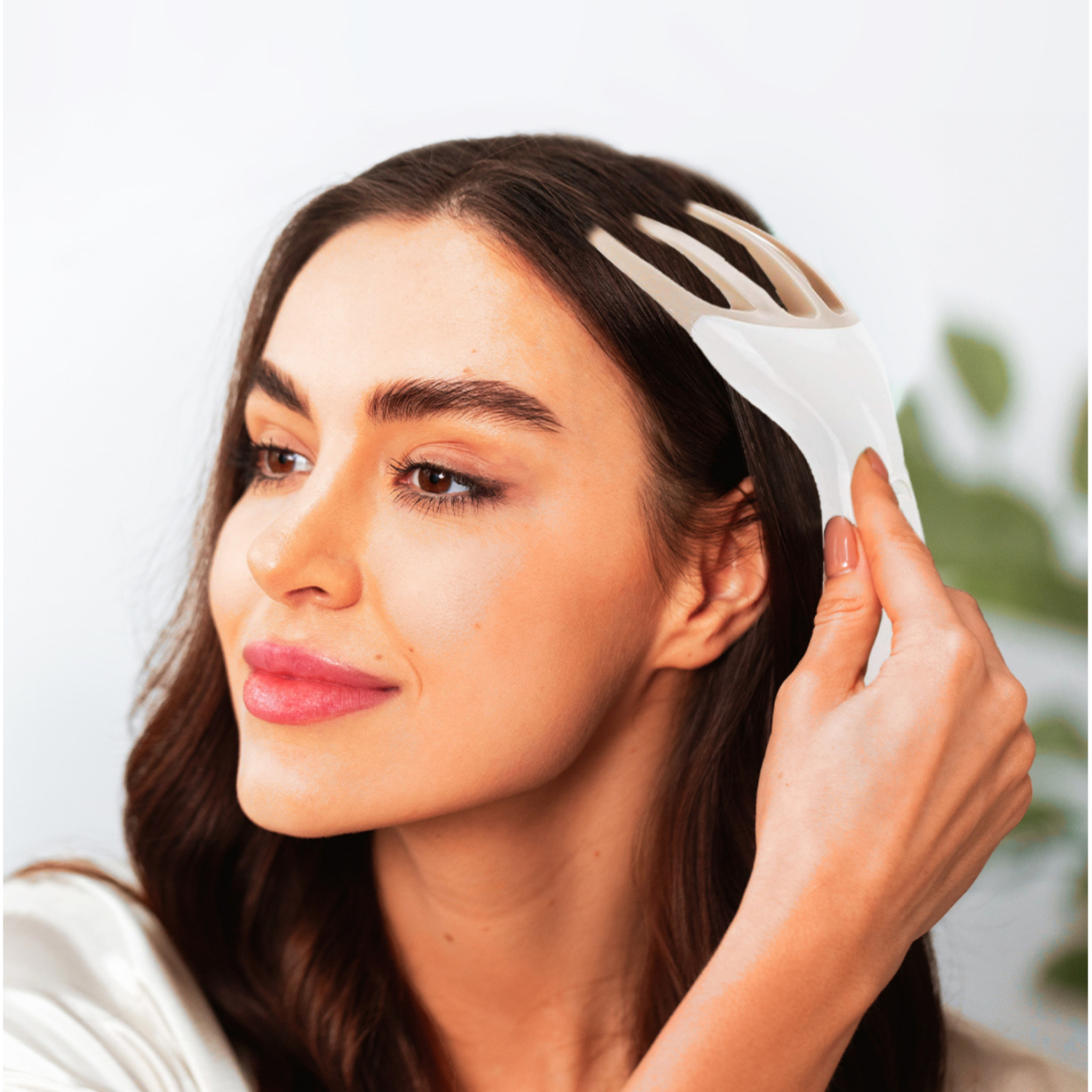 Masajeador electrónico del cuero cabelludo para estimulación.