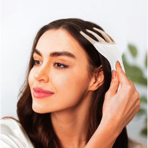 Masajeador electrónico del cuero cabelludo para estimulación.