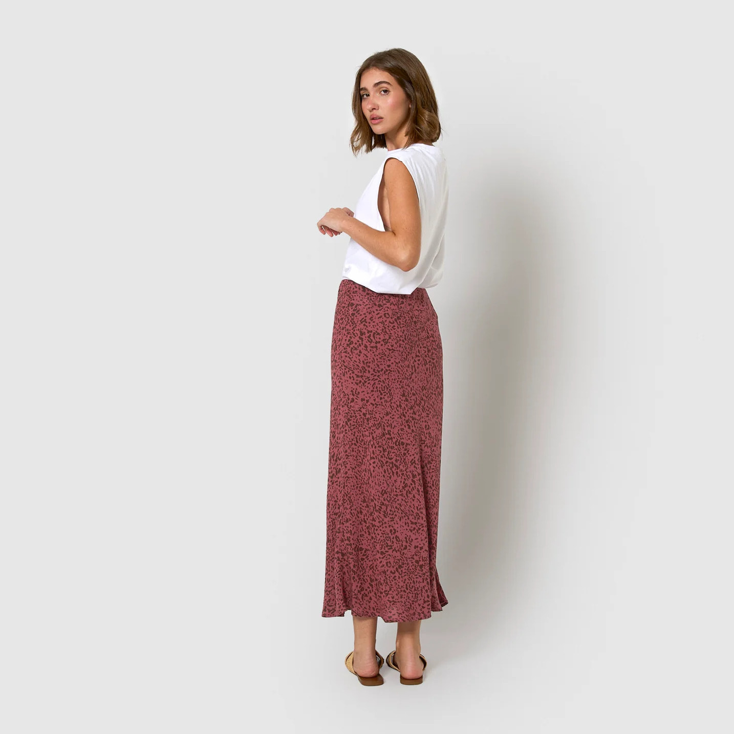 Falda midi bambula detalles plisados berry rosa