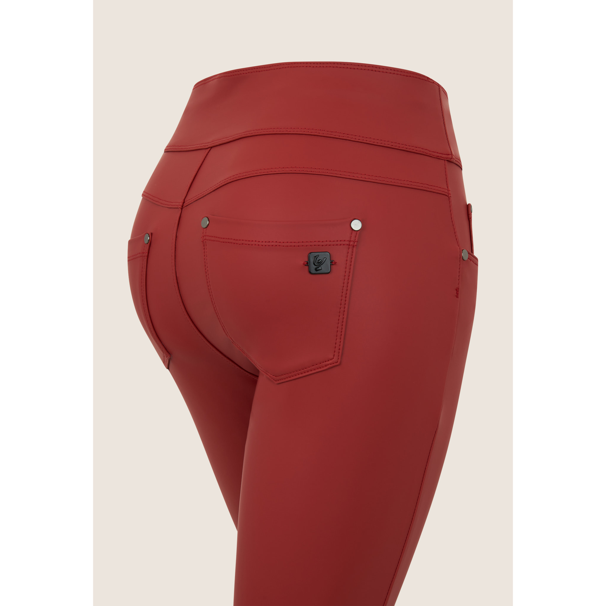 Pantalone skinny vita media senza bottoni in similpelle