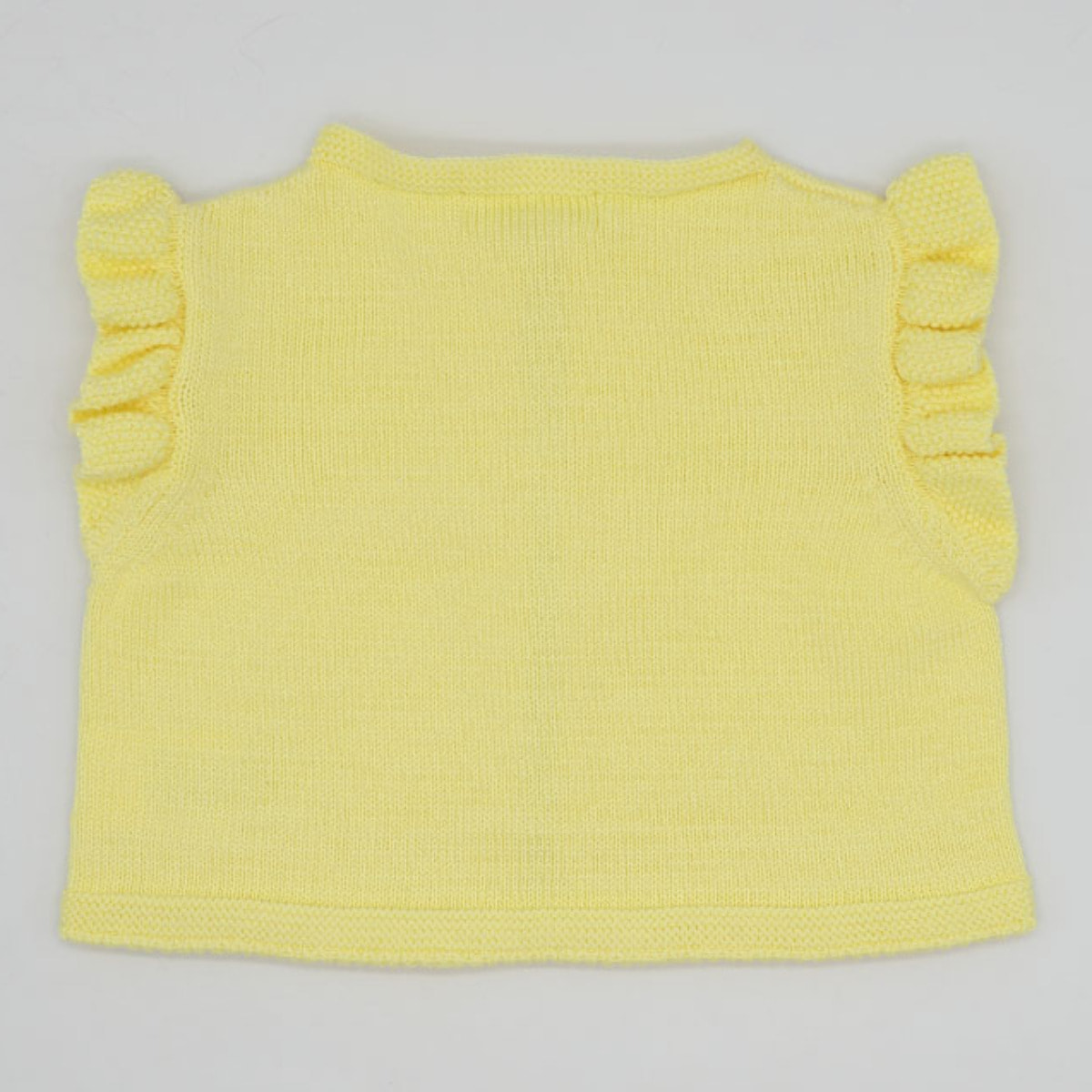 CHALECO AMARILLO CON VOLANTE Y LAZADA