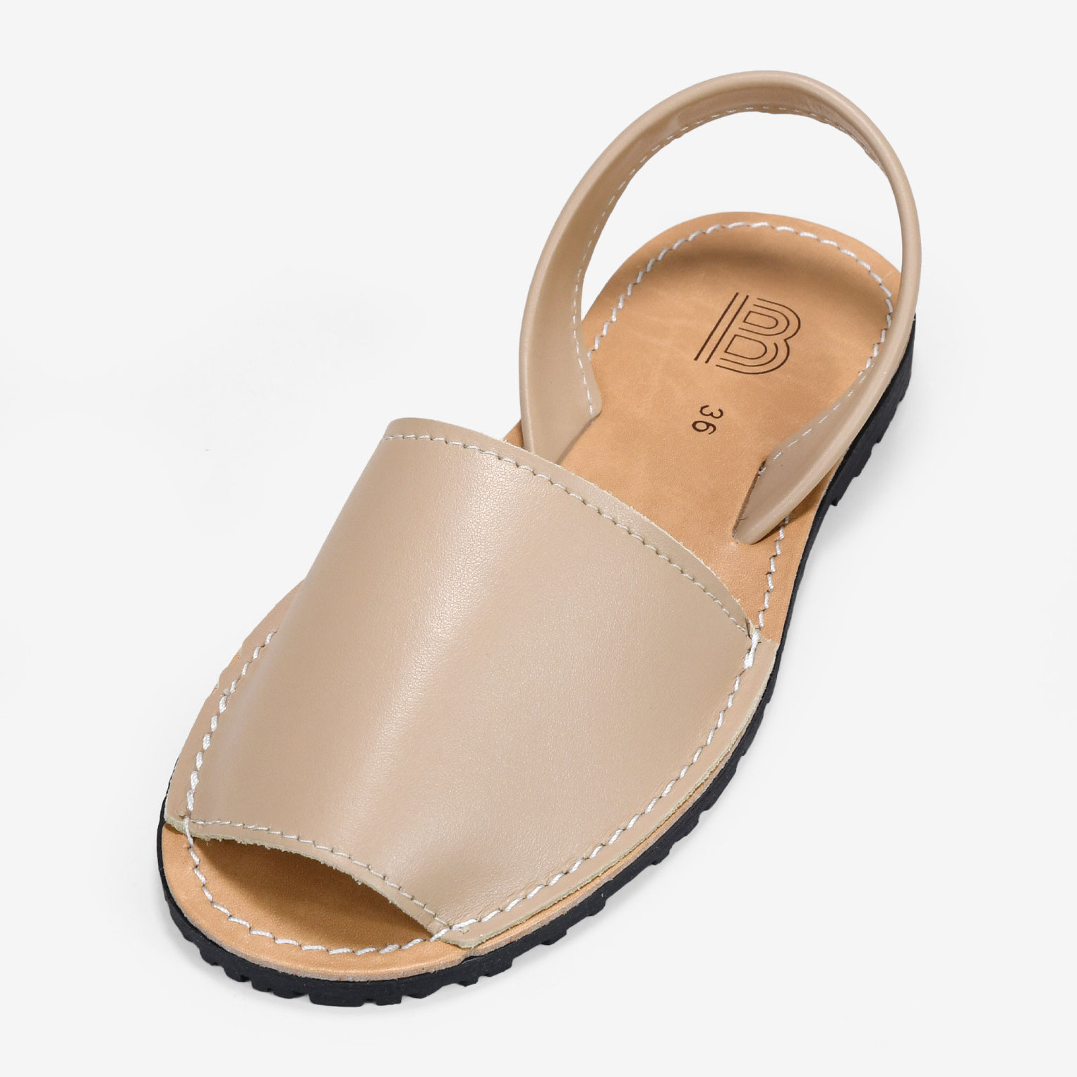 Abarcas planas en piel beige