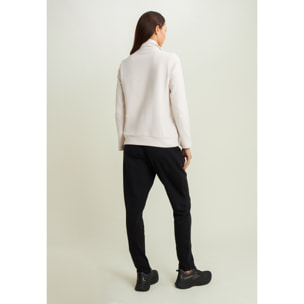 Tuta sportiva collo alto con scritta in strass