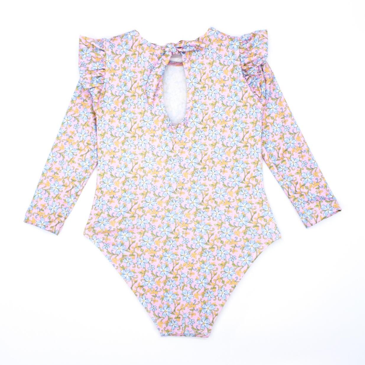 Bañador de manga larga de flor azul, con volantes.