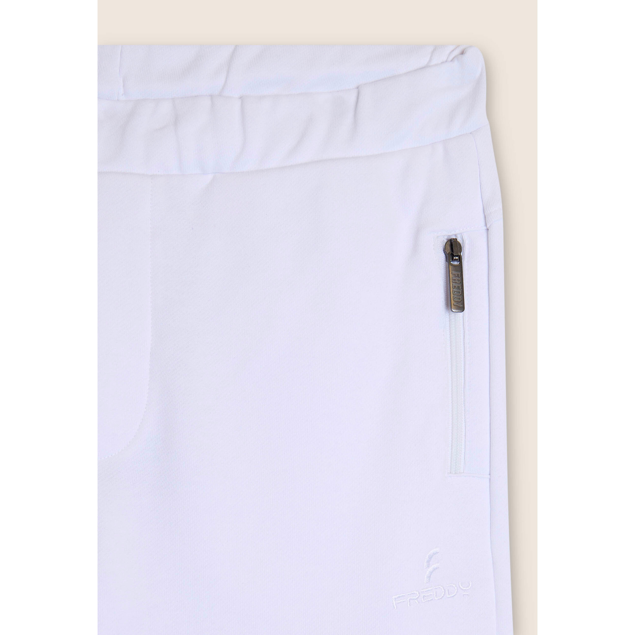 Pantaloni sportivi con tasche zippate