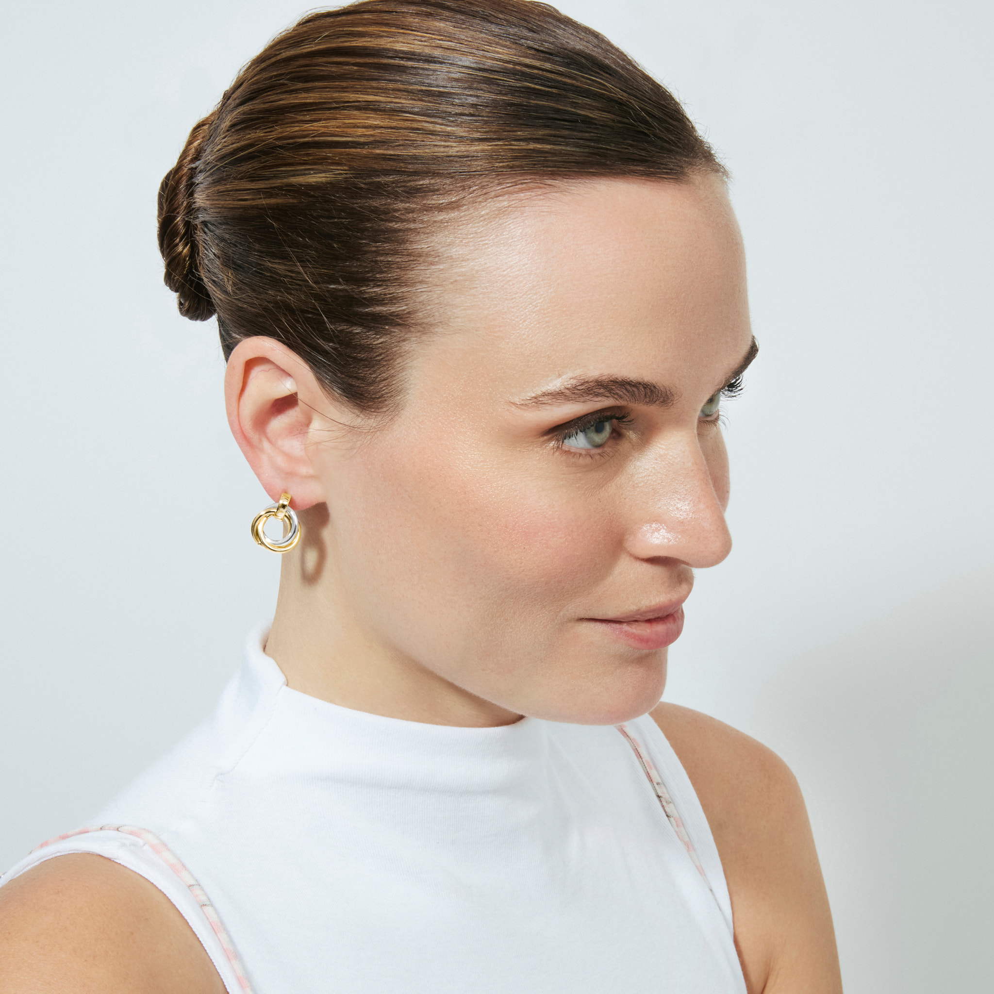 Pendientes Uhuil acabado plata y oro amarillo 18k