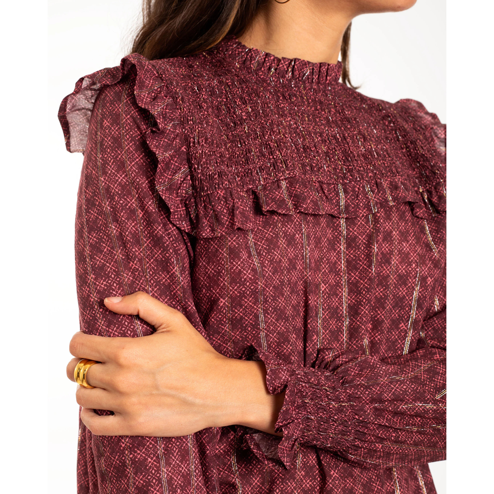 Blusa de manga larga con nido de abeja