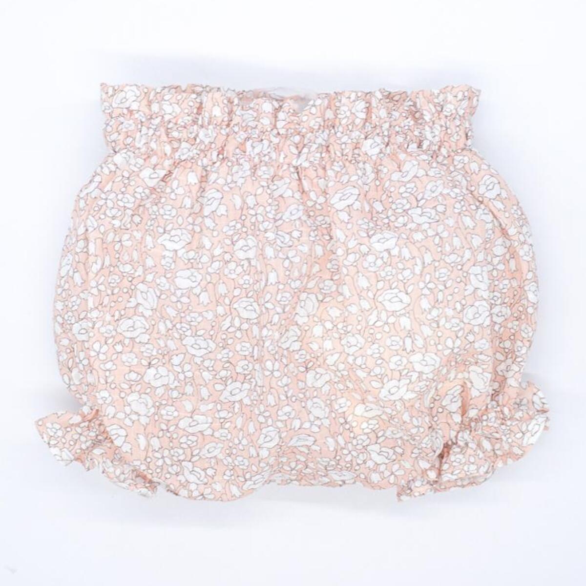 Ranita de flores rosas, goma en cintura y en las piernas.