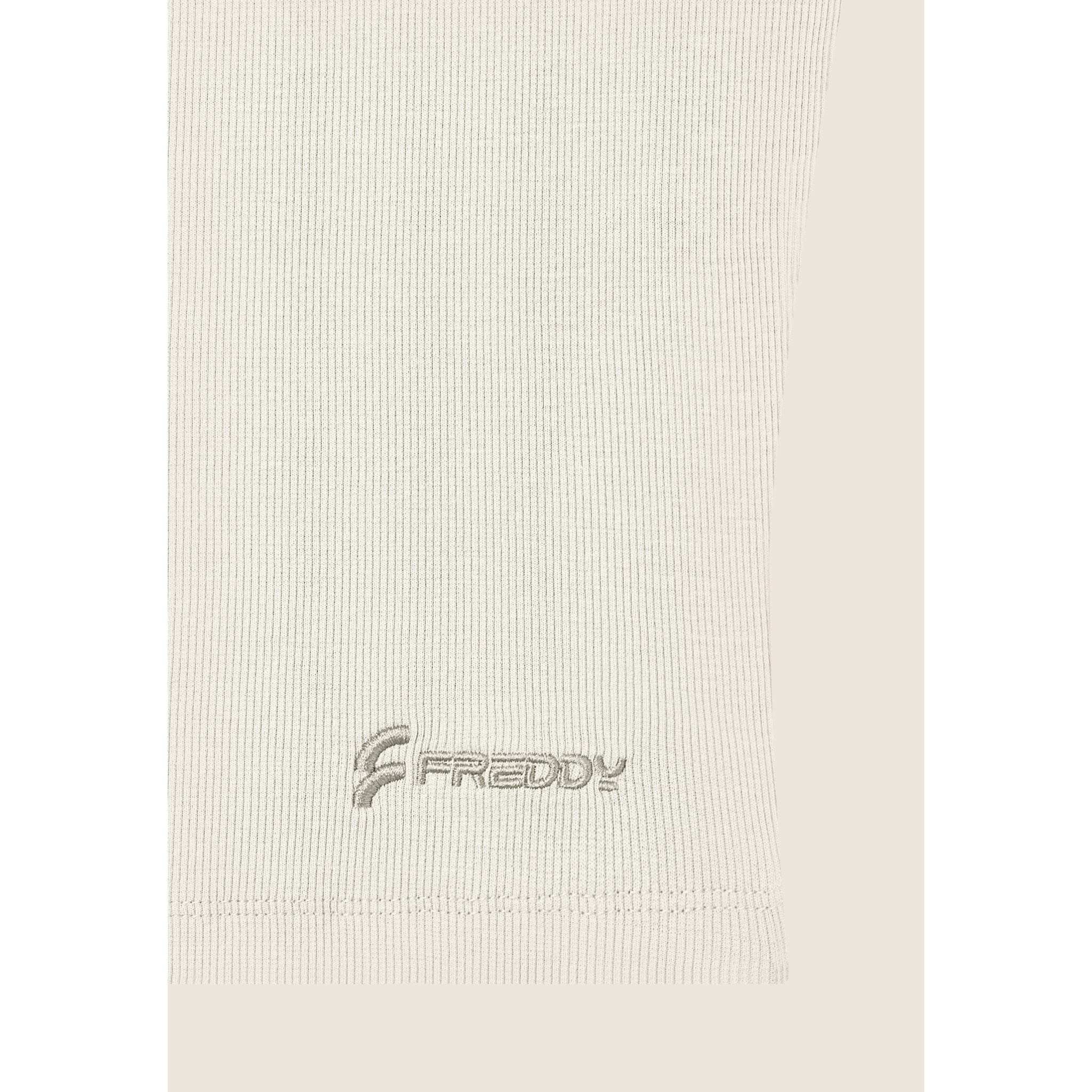 Top a costine stretch con scollo asimmetrico