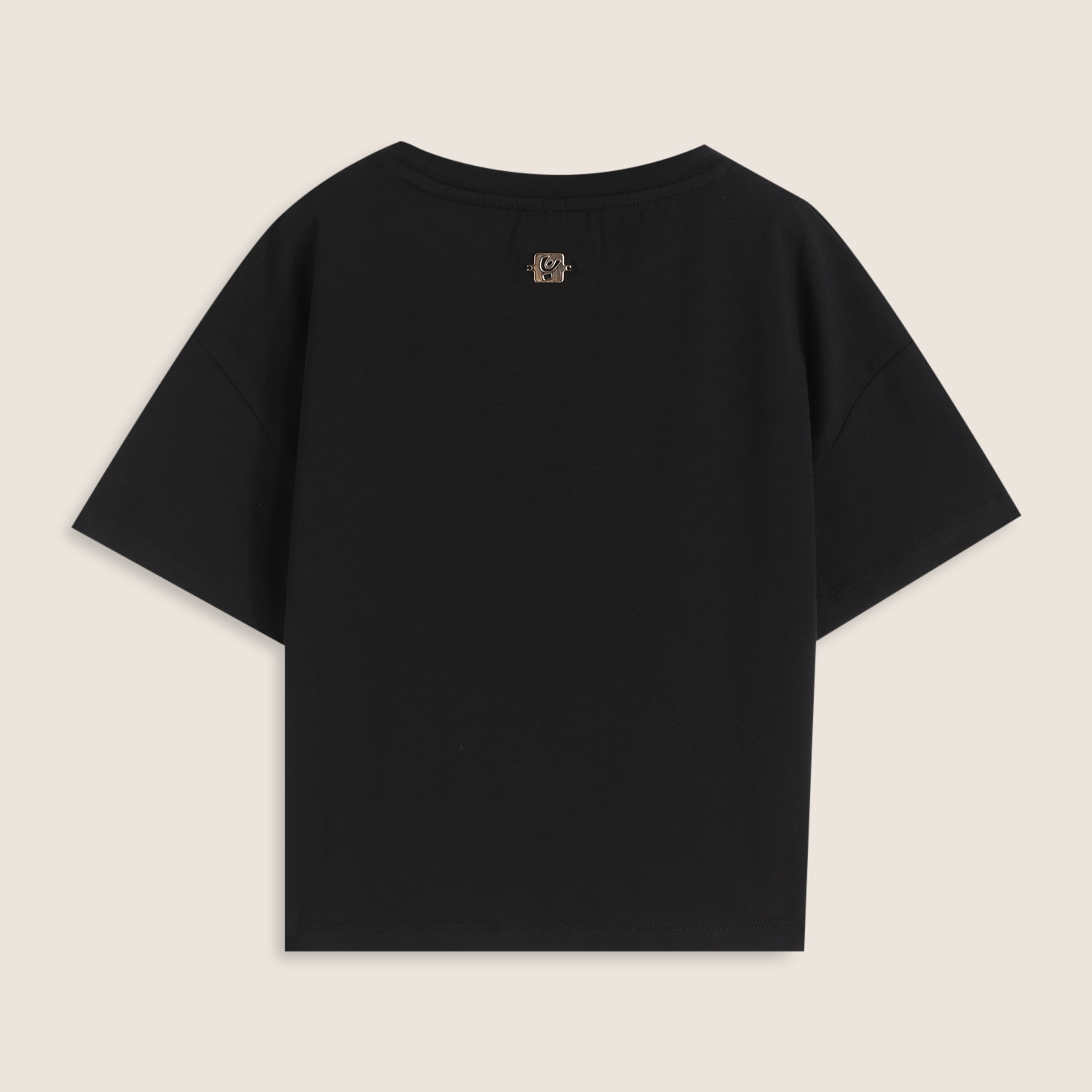 T-shirt cropped bambina con logo borchiato