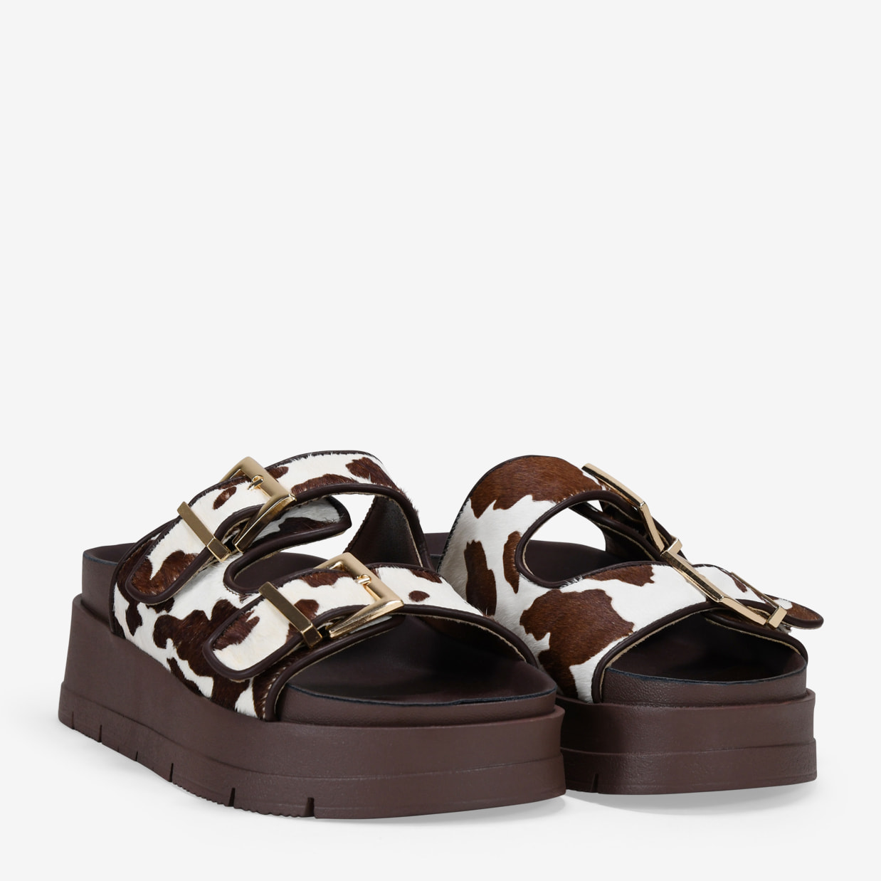 Sandalias de plataforma con pelo print vaca