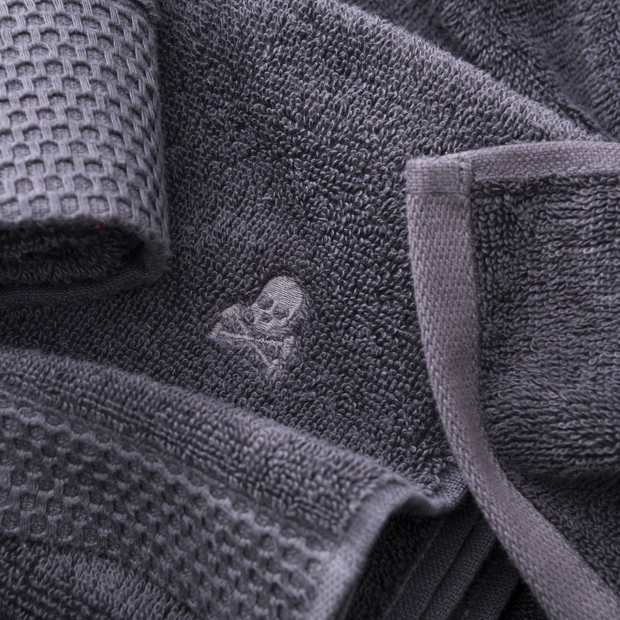 Juego de toallas nidus (30x50cm + 50x100cm + 90x150cm) 100% algodón en color gris con logo bordado scalpers home