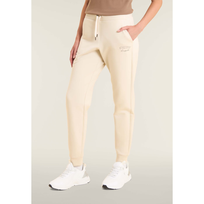 Pantaloni sportivi con fondo a polsino e coulisse