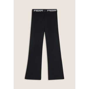 Pantaloni sportivi a zampa con elastico logato