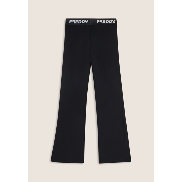 Pantaloni sportivi a zampa con elastico logato