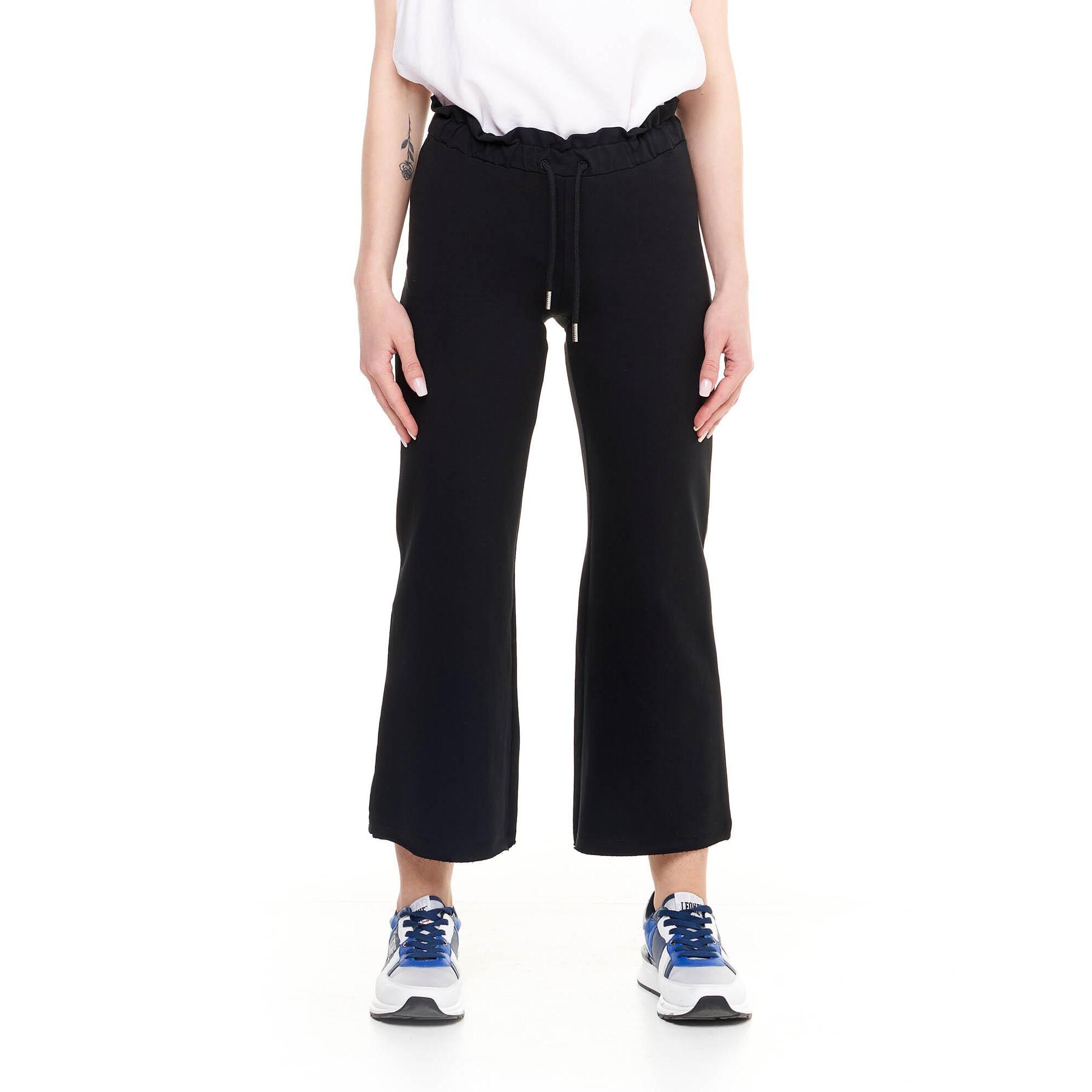 Pantalones deportivos de mujer brillantes hasta los tobillos