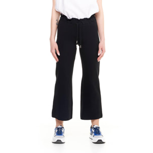Pantalones deportivos de mujer brillantes hasta los tobillos