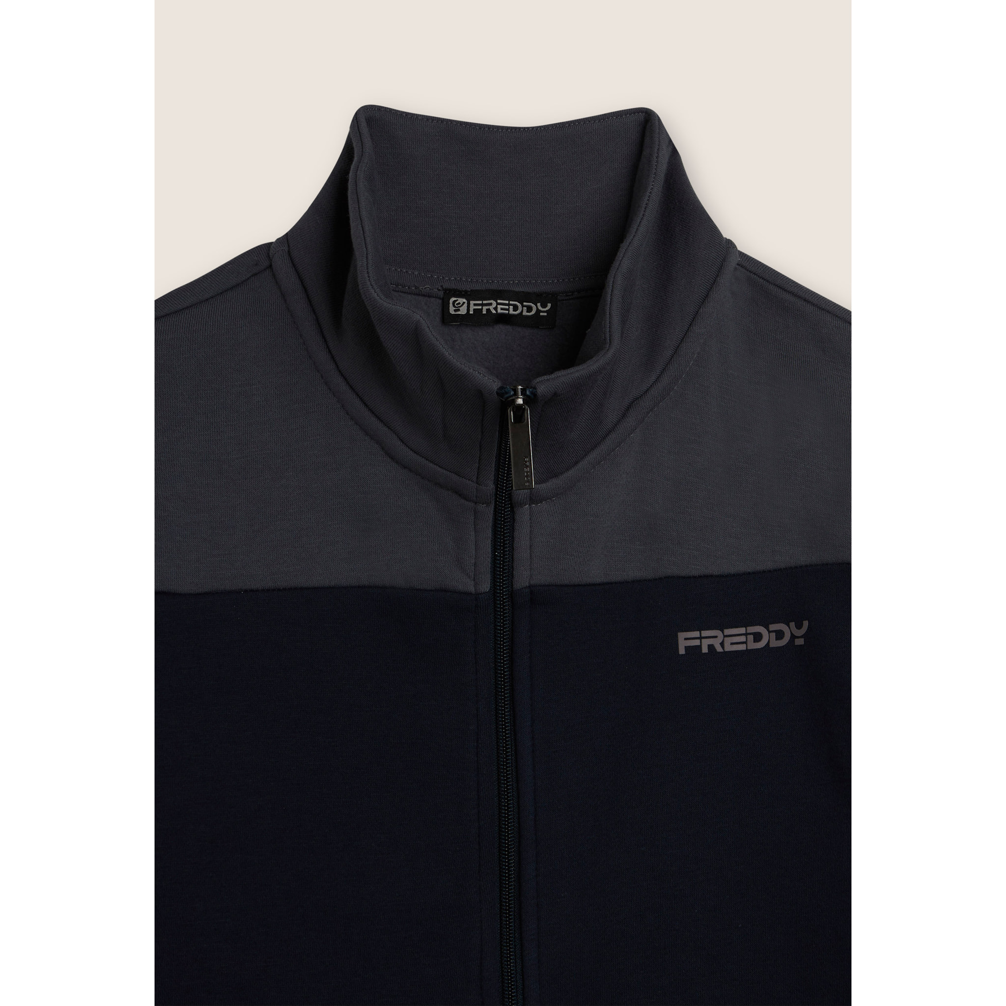 Tuta collo alto con full zip e dettagli colour block