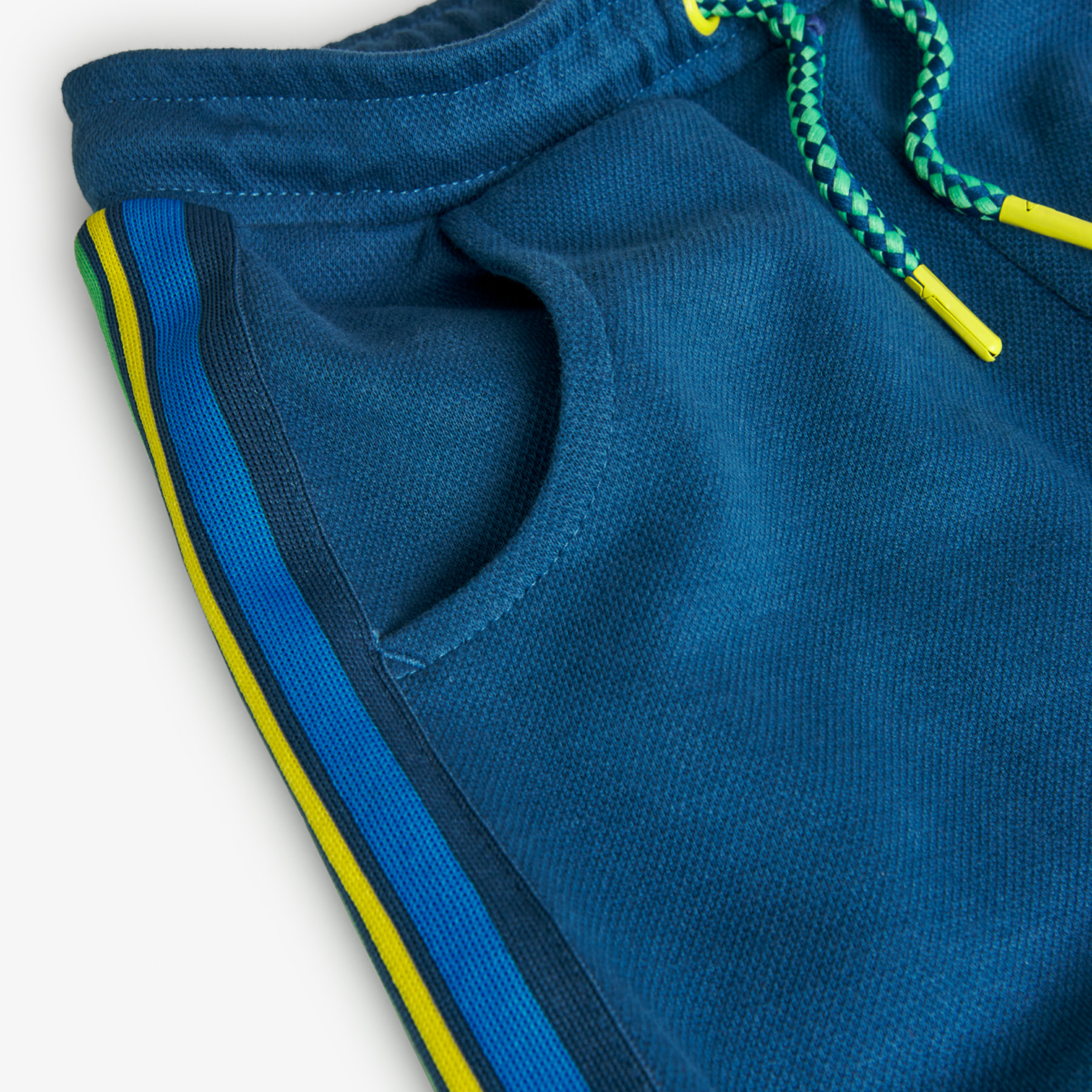 PantalÃ³n de piquÃ© para niÃ±o liso de color azul Ã­ndigo