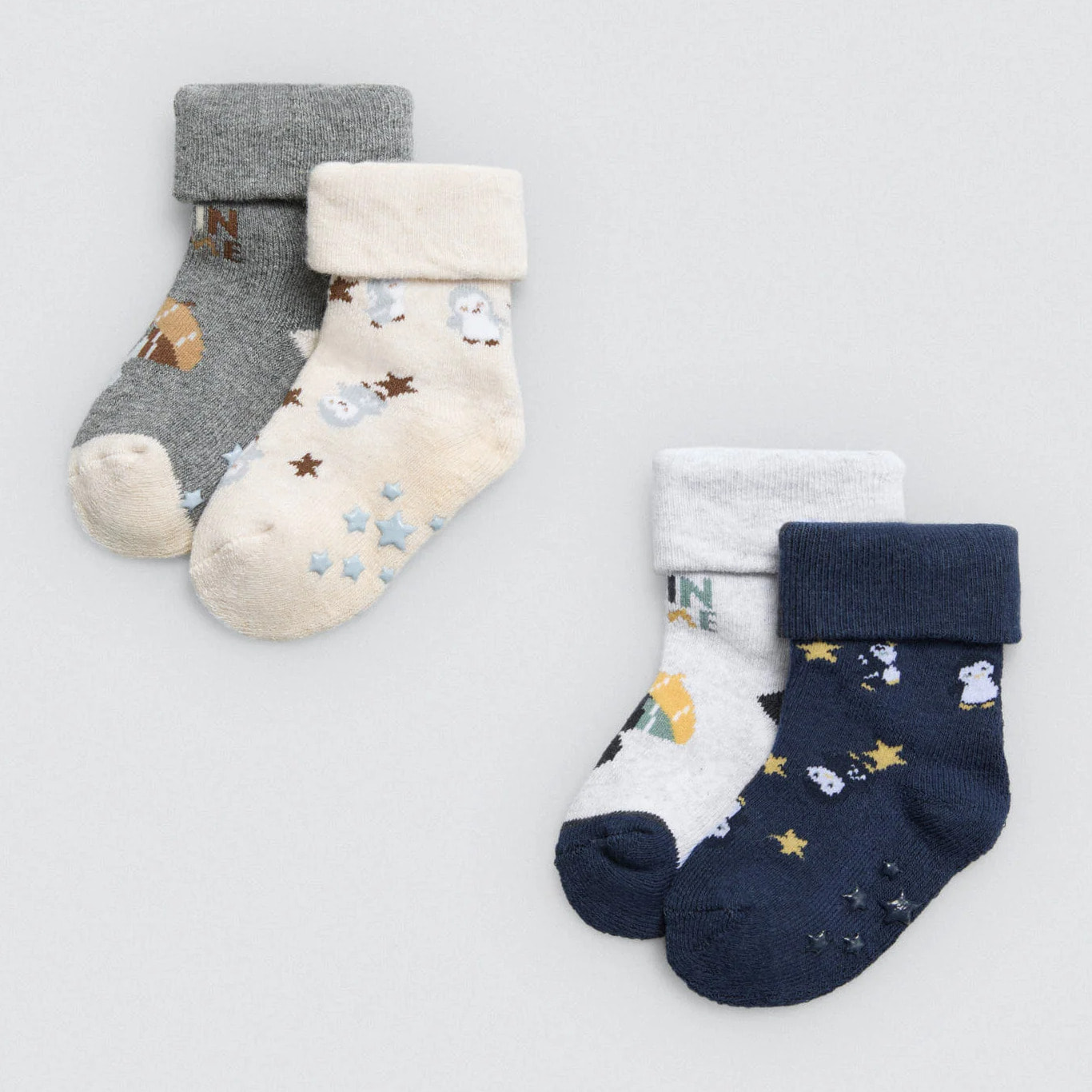 Confezione da 4 calzini termici antiscivolo per neonato Penguin Toy