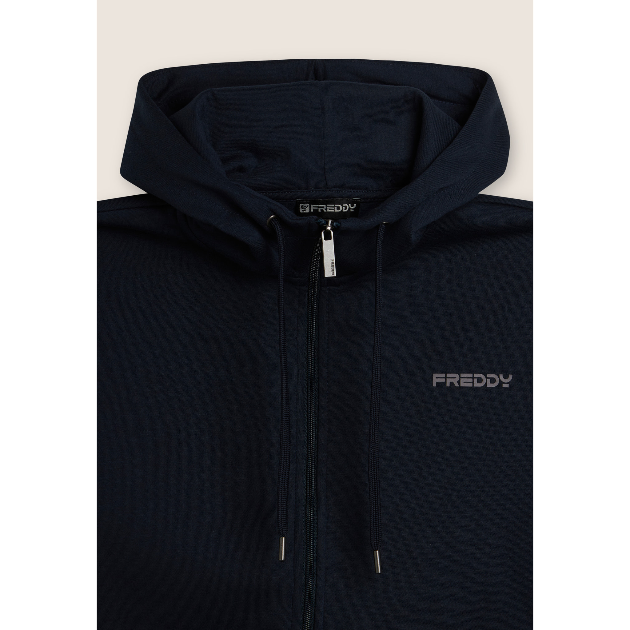 Tuta con full zip, cappuccio e fondo a polsino