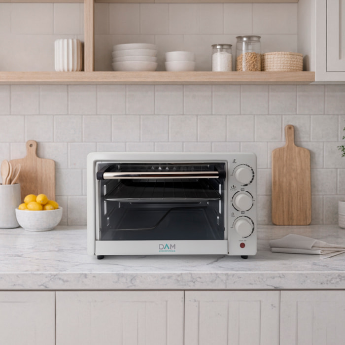Forno elettrico da banco con capacità di 25 litri. Pannello di controllo meccanico e potenza di 1300 W.