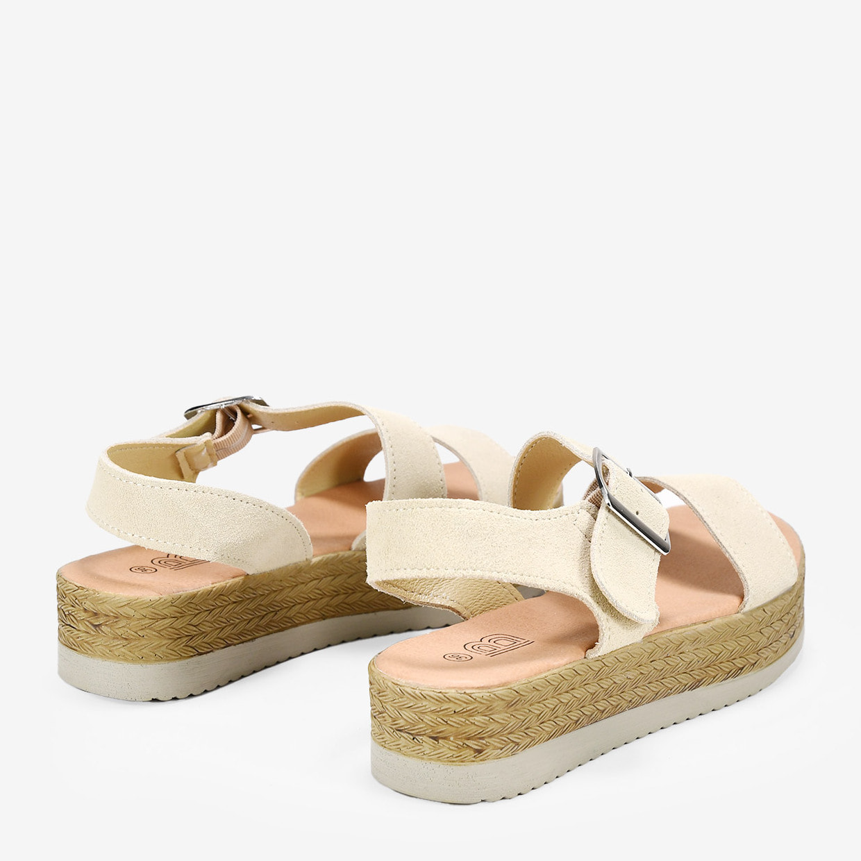 Sandalias de piel beige con hebilla y plataforma