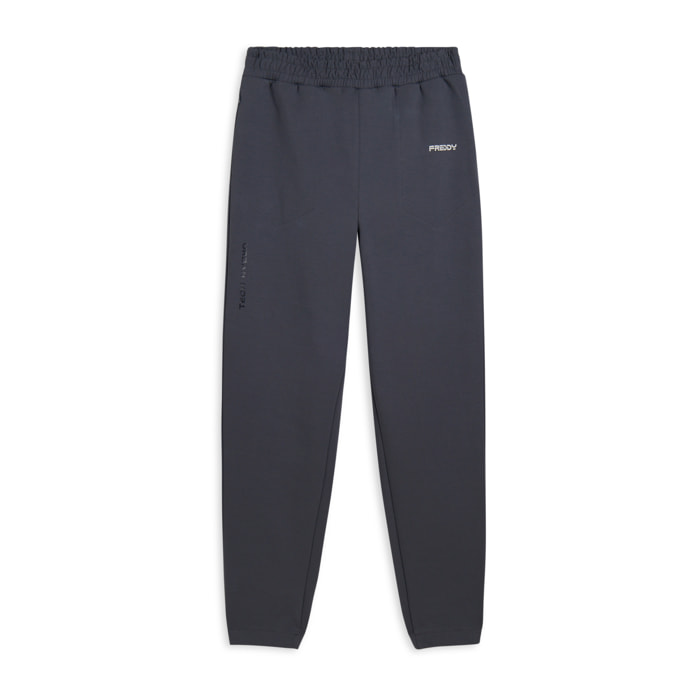 Pantaloni slim in interlock con dettagli lucidi