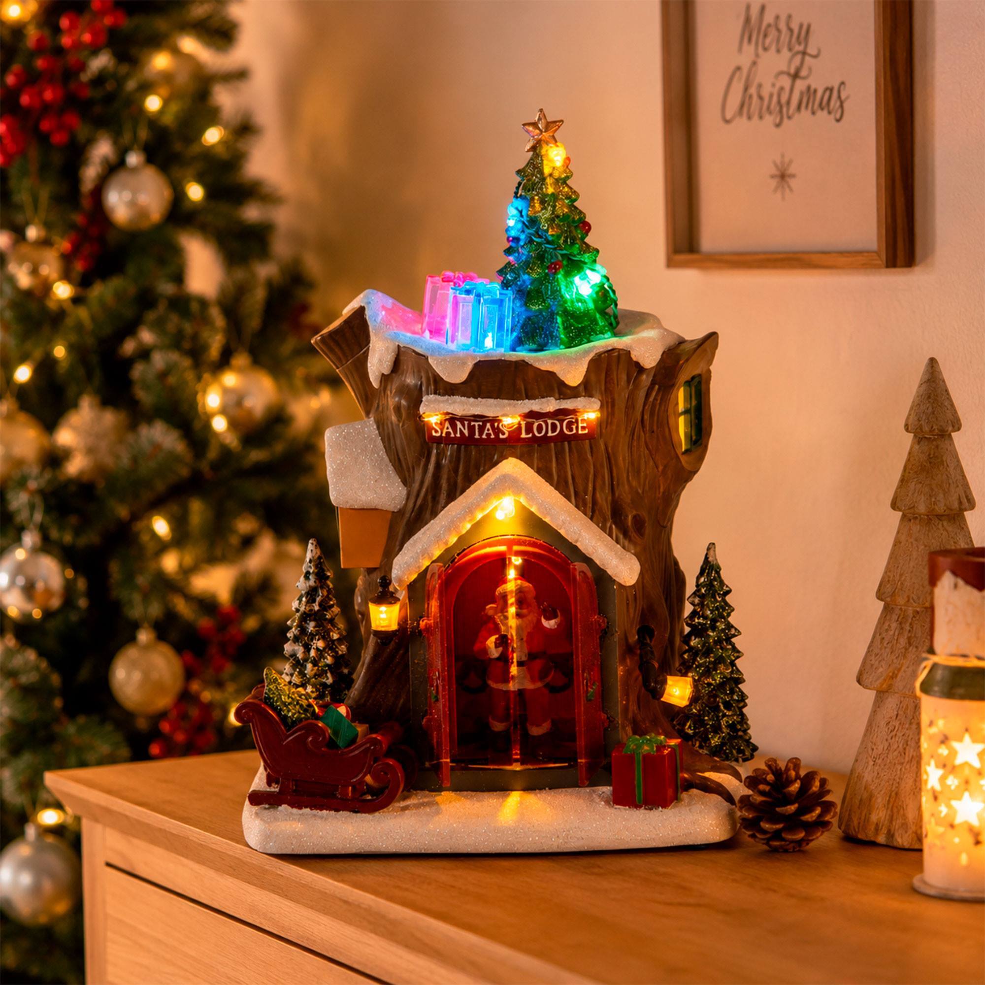 Cabaña de papá noel con luces led, movimiento y música, usb o pilas 18,5x17x25,5 cm