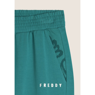 Pantaloni con elastico sul fondo e dettagli floreali