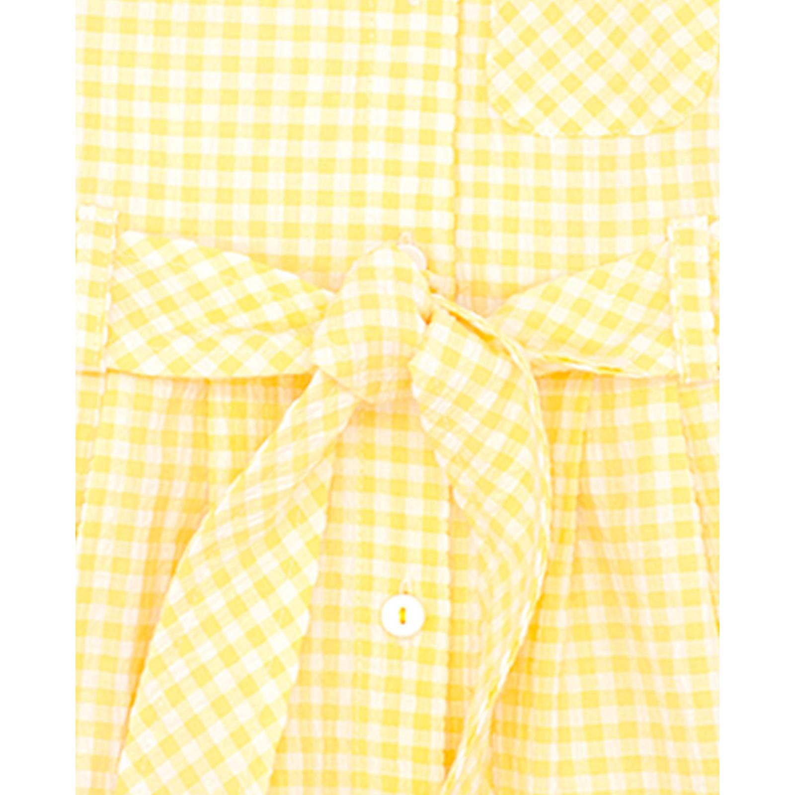 Vestido de manga corta de cuadros vichy amarillos. Bolsillos, cuello y cinturon. Botones en el centro.