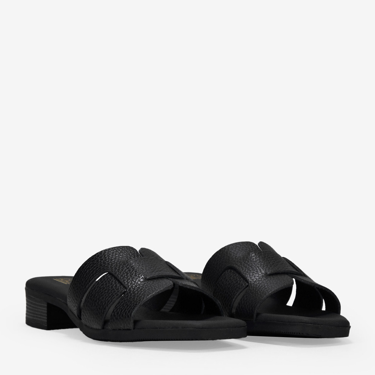 Sandalias de piel negras destalonadas con tacón bajo
