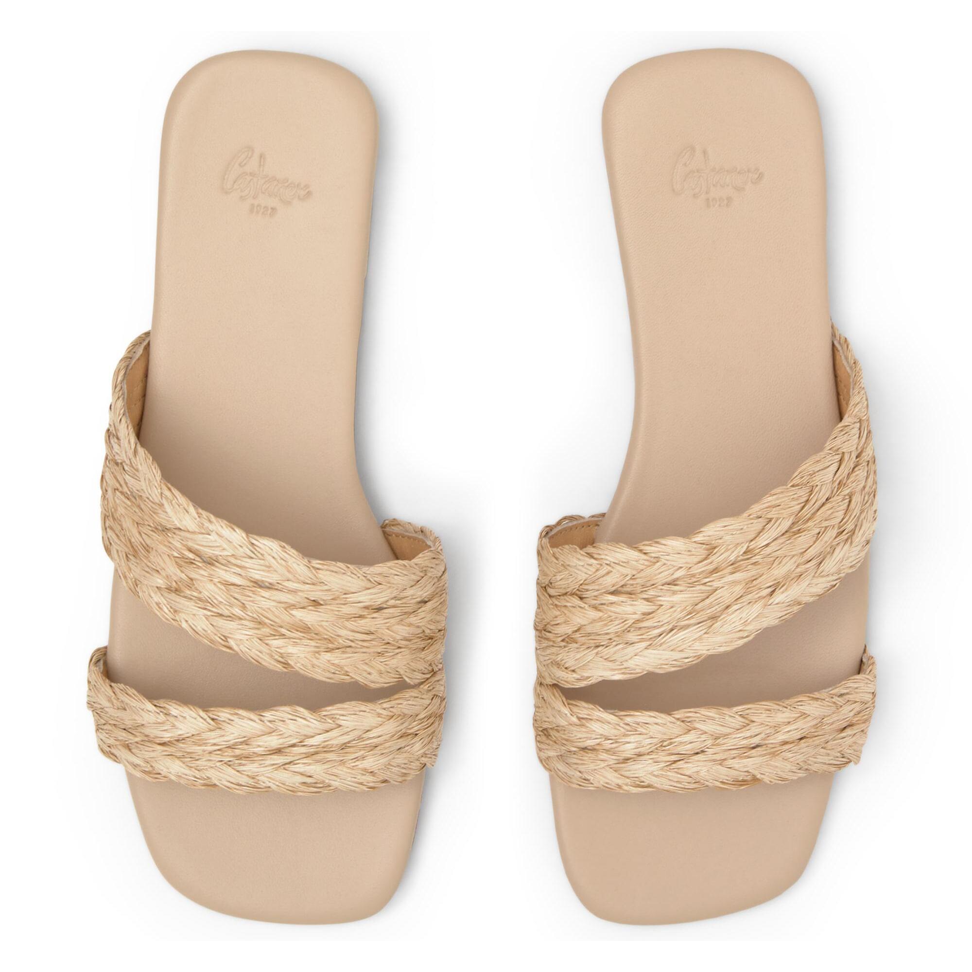 Sandalia plana slip-on Paz en rafia trenzada