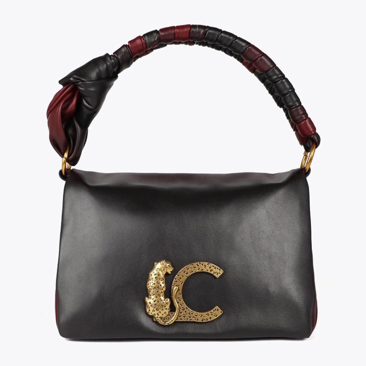 Borsa a tracolla con patta e manico annodato. Logo LC leopardo