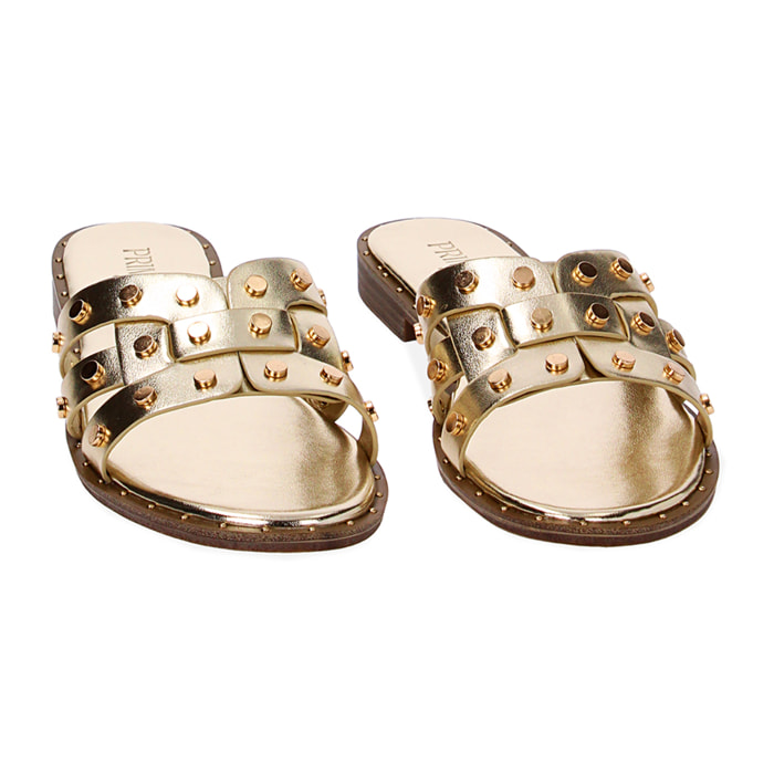 Sandalias planas doradas en laminado
