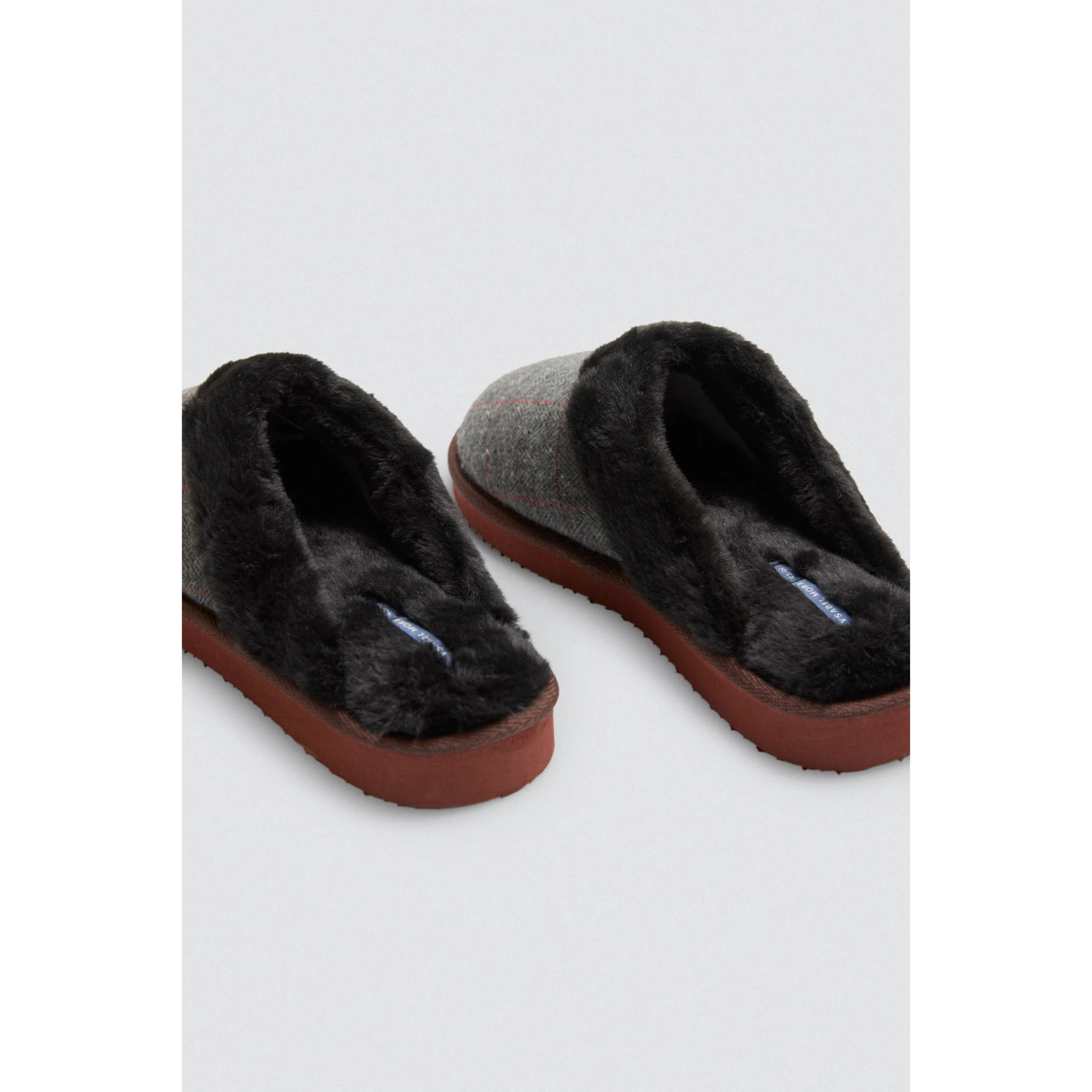 Pantofole a quadri con pelliccia